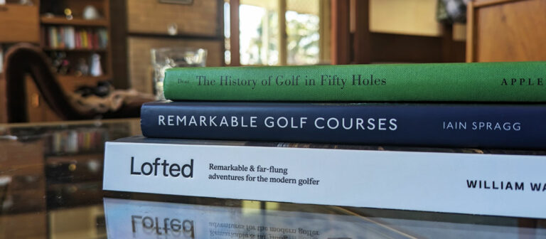 golf books on coffee table